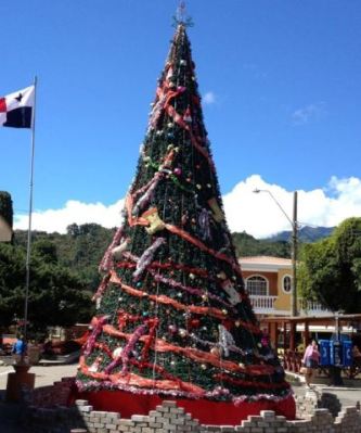 The town square is festively decorated for Christmas.
