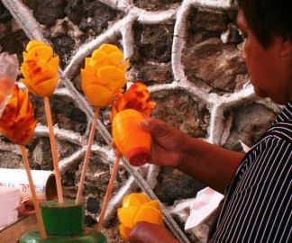 A mango on a stick makes a great quick snack.