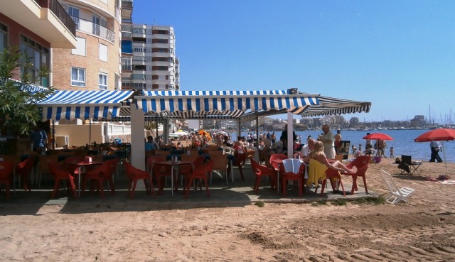 Beach cafés thrive during tourist season.  Bring a chair, a towel and some sunblock and you need not leave the beach all day.