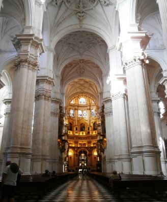 There are two identical pipe organs facing each other overlooking this massive sanctuary of the Cathedral of Granada.