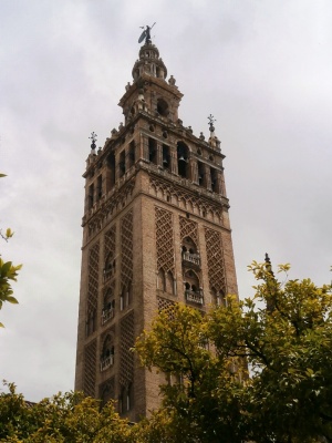 The bell tower of the Cathedral of Seville was originally a minaret for the mosque which once stood adjacent.  Over 340 feet high, the top is accessed by 36 ramps which allowed horsemen to ride to the top.  The Giralda is named for the weathervane at its top.